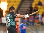 Daryl Mitchell slams half-century in the third T20I. Daryl Mitchell slams half-century in the third T20I.