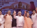 Chief minister Yogi Adityanath and others during the inauguration of projects in Kanpur on Monday. (PTI PHOTO)