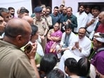 Deputy chief minister Brajesh Pathak meets the family members at the victims’ residence in the Saadatganj area of Lucknow, on Tuesday. (Deepak Gupta/HT)