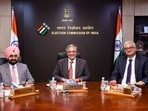 Chief Election Commissioner Gyanesh Kumar with Election Commissioners S S Sandhu and Vivek Joshi during a meeting.