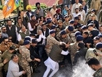 Protesters scuffle with securitymen in Shimla. (Deepak Sansta/HT) Protesters scuffle with securitymen in Shimla. (Deepak Sansta/HT)