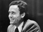 Ted Bundy smiles during the second day of jury selection for his murder trial in a Dade County courtroom in Miami, June 27, 1979.