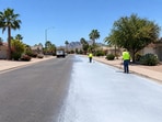 Representative image of a road with reflective pavement treatment, illustrating the city's 2020 effort to reduce pavement temperatures in heat-baked communities.