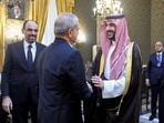 Iran's President Masoud Pezeshkian (C-L) shaking hands with Saudi Arabia's Defence Minister Prince Khalid bin Salman Al-Saud after a meeting with the Pakistani army chief and the Turkish intelligence chief in Tehran on October 26, 2026. (AFP)