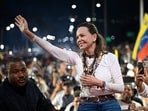 María Corina Machado greets supporters upon her arrival in Caracas on Oct. 25, 2026.