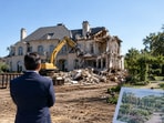 Representative image of a mansion being demolished as its materials are salvaged for reuse, with landscaping planned for the site.(AI- generated/ ChatGPT)