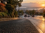 A downhill intersection approach covered in a high-friction surface, the kind of treatment Bellevue used in 2004.