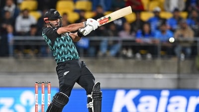 Daryl Mitchell hit an unbeaten 89 to help New Zealand post 199/3 in the allotted twenty overs. He made full use of short square boundaries and used the ground dimensions to his advantage.&nbsp; (AP)