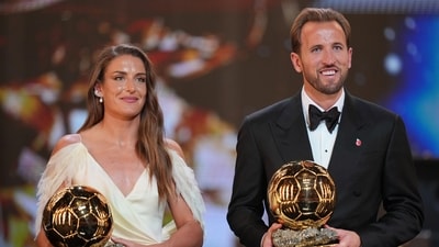 England's soccer player Harry Kane and Spain's Alexia Putellas win the player of the year trophy during the Ballon d'Or ceremony at the London Palladium Theatre in London, England, Monday, Oct. 26 (AP Photo/Kin Cheung) England's soccer player Harry Kane and Spain's Alexia Putellas win the player of the year trophy during the Ballon d'Or ceremony at the London Palladium Theatre in London, England, Monday, Oct. 26 (AP Photo/Kin Cheung)