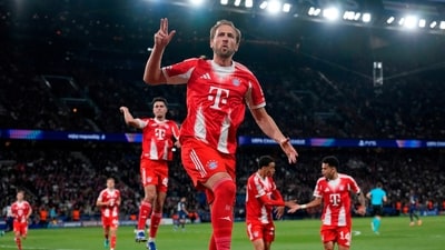 Bayern's Harry Kane celebrates after scoring a penalty, the opening goal of his team during the Champions League semifinal first leg soccer match between Paris Saint-Germain and Bayern Munich in Paris (AP Photo/Christophe Ena) Bayern's Harry Kane celebrates after scoring a penalty, the opening goal of his team during the Champions League semifinal first leg soccer match between Paris Saint-Germain and Bayern Munich in Paris (AP Photo/Christophe Ena)