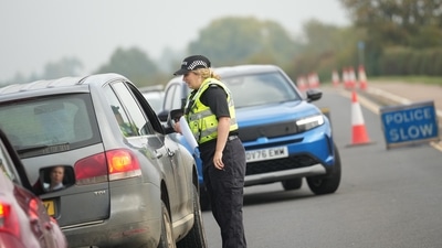 Police officers stand at a checkpoint near RAF Fairford air base, in Fairford, England, on September 29, 2026. (File Photo/AP) Police officers stand at a checkpoint near RAF Fairford air base, in Fairford, England, on September 29, 2026. (File Photo/AP)