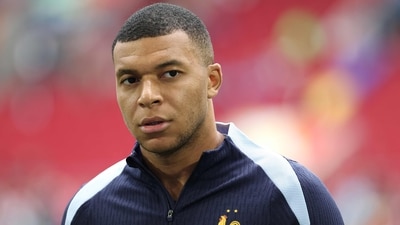 France's forward #10 Kylian Mbappe looks on ahead of the UEFA Euro 2024 round of 16 football match between France and Belgium at the Duesseldorf Arena in Duesseldorf on July 1, 2024 (AFP) France's forward #10 Kylian Mbappe looks on ahead of the UEFA Euro 2024 round of 16 football match between France and Belgium at the Duesseldorf Arena in Duesseldorf on July 1, 2024 (AFP)