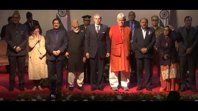 Jammu and Kashmir lieutenant governor Manoj Sinha and chief minister Omar Abdullah with the new ministers after the oath-taking ceremony in Srinagar on Tuesday. Jammu and Kashmir lieutenant governor Manoj Sinha and chief minister Omar Abdullah with the new ministers after the oath-taking ceremony in Srinagar on Tuesday.