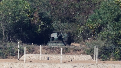 A North Korean self-propelled 122-mm howitzer with the words that read as "Destroy the U.S. imperialist aggressors, in Gimpo, South Korea, October 26. (REUTERS)