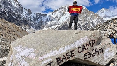 Pradeep Mundeja hoists a flag at Everest Base Camp in Nepal. (Instagram/@pnbindia) Pradeep Mundeja hoists a flag at Everest Base Camp in Nepal. (Instagram/@pnbindia)