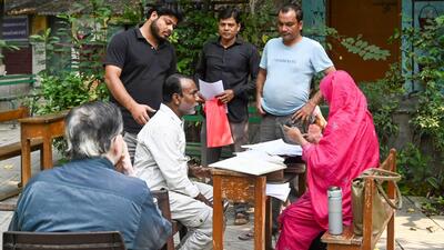 Voters visit a special camp for enrolment and correction of electoral details after receiving notices during the final round of special camps under the ongoing SIR of electoral rolls at Okhla (HT Photo/Arvind Yadav)