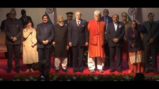 Jammu and Kashmir lieutenant governor Manoj Sinha and chief minister Omar Abdullah with the new ministers after the oath-taking ceremony in Srinagar on Tuesday.