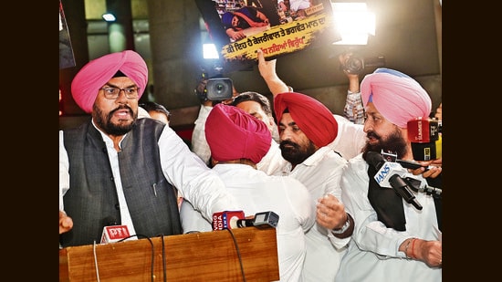 Leader of the Opposition Partap Singh Bajwa and other Congress MLAs get into a heated exchange during a media interaction during the Punjab Assembly session in Chandigarh on Tuesday. (HT Photo)