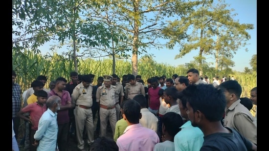 South Kheri forest and the police officials after the leopard attack in south Kheri forest division area on Tuesday. (HT Photo)