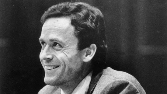 Ted Bundy smiles during the second day of jury selection for his murder trial in a Dade County courtroom in Miami, June 27, 1979.