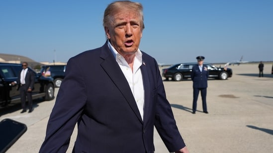 President Donald Trump speaks to media before boarding Air Force One, Tuesday, Oct. 27, 2026. (AP Photo/Alex Brandon)