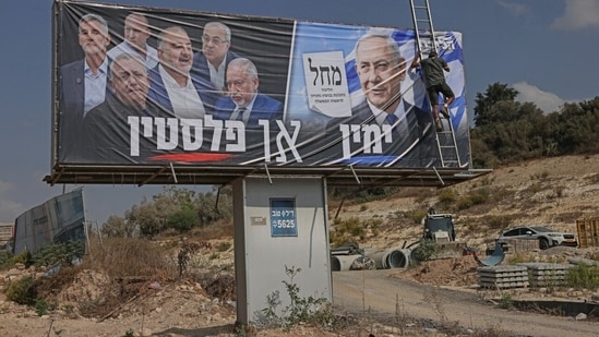 A billboard in Nazareth, Israel, shows Israeli Prime Minister Benjamin Netanyahu alongside faces of the opposition.