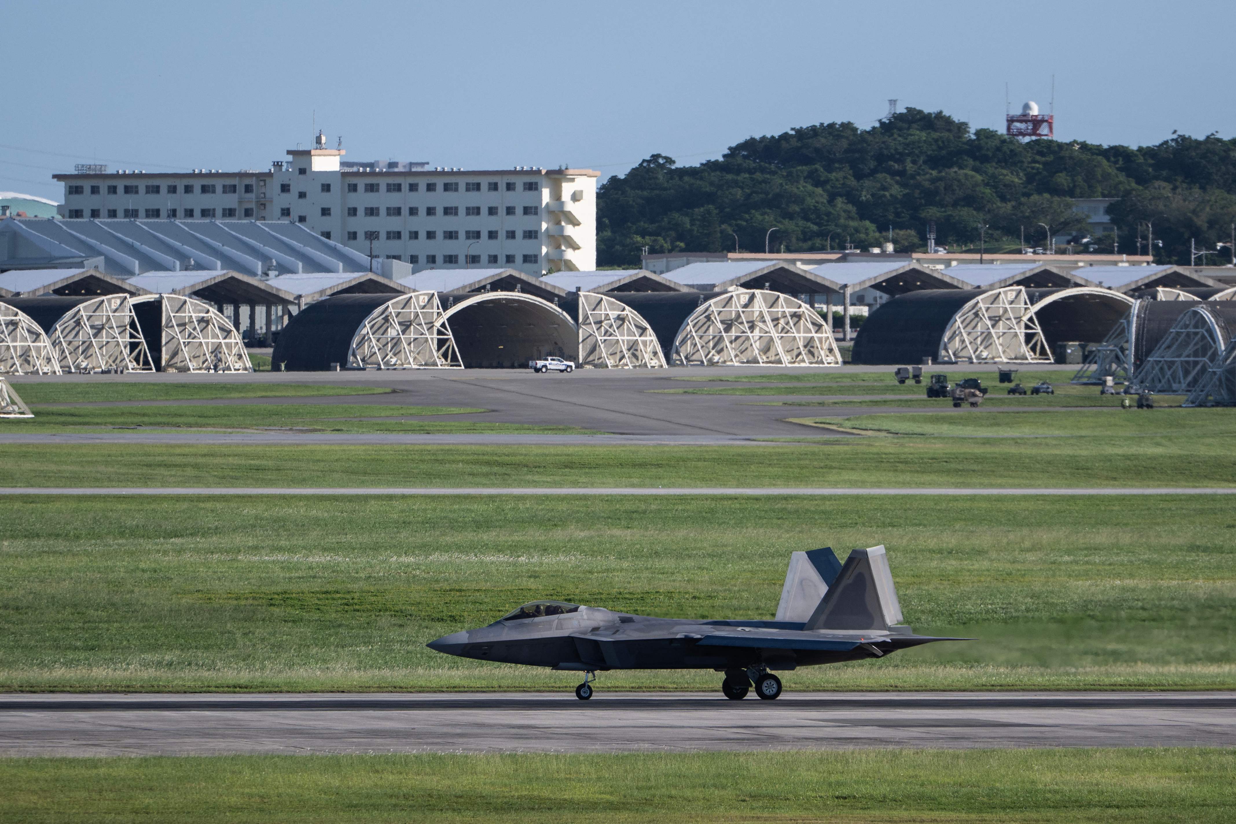 An F-22 Raptor lands at Kadena Air Base in Kadena, Okinawa prefecture on October 9, 2026. (AFP)