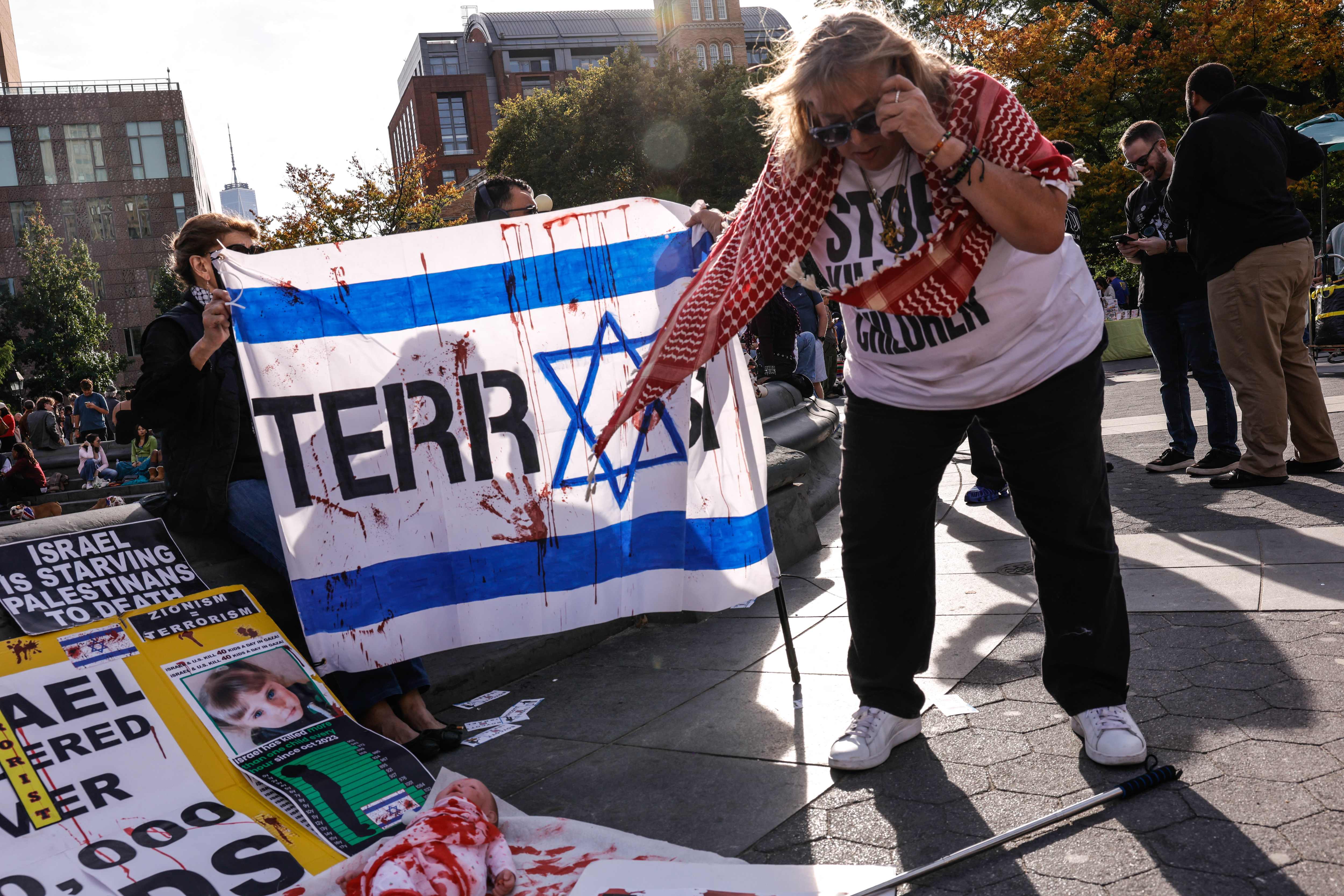 A demonstrator protests against Israel as people attend a demonstration in support of the Palestinian people, in New York City on October 10, 2026. Demonstrators gathered calling for an end to Israeli strikes on Gaza, three years after Hamas's October 7 attack. (Photo by kena betancur / AFP) (AFP) A demonstrator protests against Israel as people attend a demonstration in support of the Palestinian people, in New York City on October 10, 2026. Demonstrators gathered calling for an end to Israeli strikes on Gaza, three years after Hamas's October 7 attack. (Photo by kena betancur / AFP) (AFP)