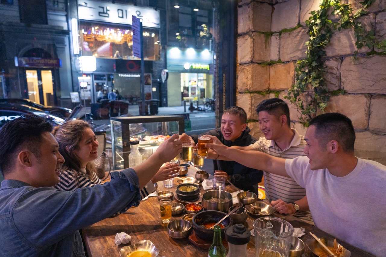 The Miss Korea restaurant hosts several waves of diners each night. The Miss Korea restaurant hosts several waves of diners each night.