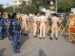 Supporters and Police personal waiting outside Bankipur Girls High School during counting day of MLC Bihar Legislative Council graduate and Teachers' Constituency, in Patna, Bihar.
