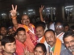 BJP’s Umesh Dwivedi celebrates with supporters at the Ramabai counting centre in Lucknow. (HT Photo)