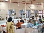 Election officials at a counting centre as the counting of votes for the Amravati Division Teachers' Constituency of the Maharashtra Legislative Council is underway at Lokshahi Bhavan, in Amravati on Tuesday. (ANI Video Grab)