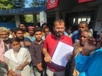 Family members of the deceased protest outside Baikunth Dham in Lucknow on Wednesday. (Sourced)