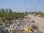 Garbage dumped along a road in Sector 72, Gurugram, on Tuesday. (Parveen KumarHT Photo)