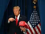 US President Donald Trump arrives to the stage for a midterm campaign rally at Lubbock Memorial Civic Center in Lubbock, Texas on October 27.
