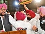 Leader of the Opposition Partap Singh Bajwa and other Congress MLAs get into a heated exchange during a media interaction during the Punjab Assembly session in Chandigarh on Tuesday.