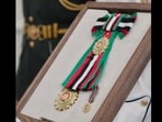 Captain Smit Machchhar and the flydubai flight crew were awarded the First Class Order of Zayed II on October 27.(Instagram/@emiratesroyalfamily)