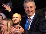 Former Governor of National Bank of Serbia (NBS) and a candidate on the electoral list "Student List - Students Win", Dejan Soskic, celebrates following the first results of the parliamentary election in Belgrade, Serbia, October 25, 2026. 