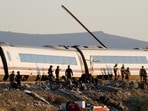 Rescue personnel work at the site of the collision of two high-speed trains between the towns of Mora and Orgaz, near Toledo, Spain, October 28, 2026. 