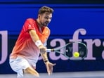 Switzerland's Stan Wawrinka returns a shot to Czech Republic's Jiri Lehecka during the first round of the Swiss Indoors tennis tournament in Basel