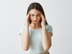 Migraine pain during periods occurs due to hormonal shifts.(Picture credit: Freepik)