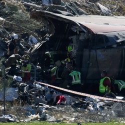 Rescue personnel work at the site of the collision of two high-speed trains between the towns of Mora and Orgaz, near Toledo, Spain, October 28, 2026. 