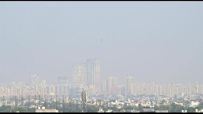 A view of skyscrapers in Noida city, shrouded in pollution in the afternoon on Wednesday. (Sunil Ghosh/HT Photo) A view of skyscrapers in Noida city, shrouded in pollution in the afternoon on Wednesday. (Sunil Ghosh/HT Photo)