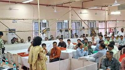 Election officials at a counting centre as the counting of votes for the Amravati Division Teachers' Constituency of the Maharashtra Legislative Council is underway at Lokshahi Bhavan, in Amravati on Tuesday. (ANI Video Grab)
