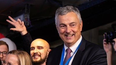 Former Governor of National Bank of Serbia (NBS) and a candidate on the electoral list "Student List - Students Win", Dejan Soskic, celebrates following the first results of the parliamentary election in Belgrade, Serbia, October 25, 2026. (REUTERS)