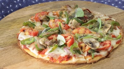 Ranveer Brar's mushroom pizza can be prepared on a regular tawa. 