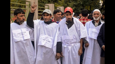 Supporters of National Conference (NC) MLA Mubarak Gul during a protest against his exclusion from the Jammu and Kashmir Cabinet, in Srinagar, Wednesday. (PTI) Supporters of National Conference (NC) MLA Mubarak Gul during a protest against his exclusion from the Jammu and Kashmir Cabinet, in Srinagar, Wednesday. (PTI)