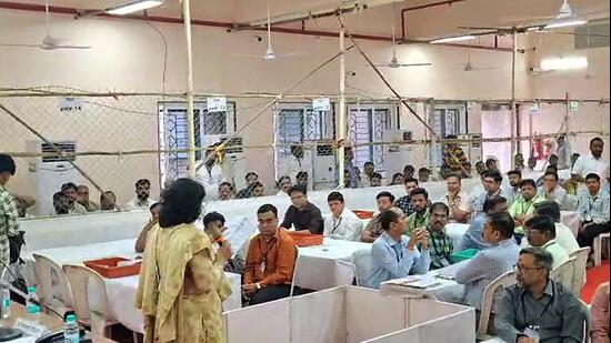 Election officials at a counting centre as the counting of votes for the Amravati Division Teachers' Constituency of the Maharashtra Legislative Council is underway at Lokshahi Bhavan, in Amravati on Tuesday. (ANI Video Grab)