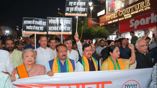 Over a thousand BJP workers marched from the Red Fort Chowk to the Town Hall. (HT Photo)