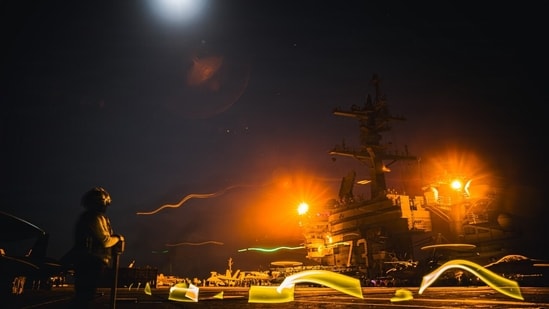The USS George Washington aircraft carrier conducting flight operations over the weekend in the Middle East.